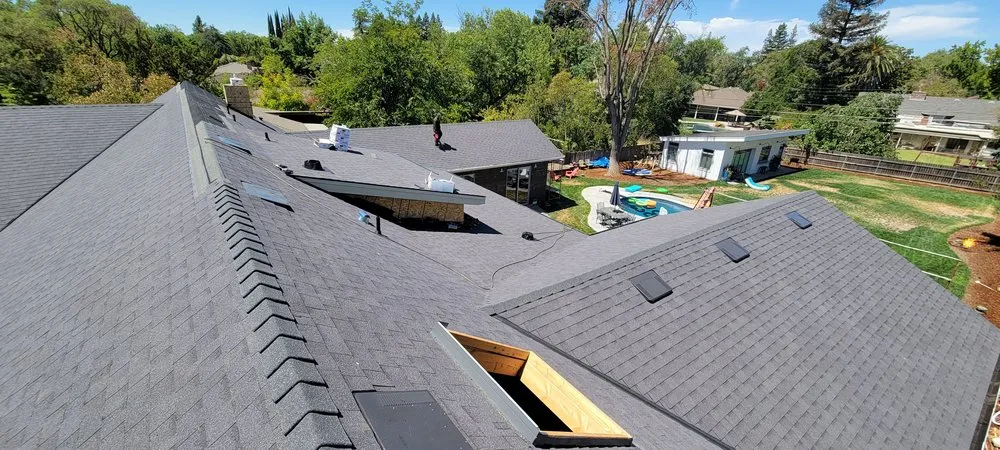 Slide of Everest Roofing