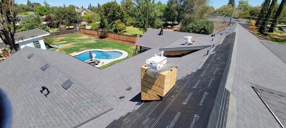 Slide of Everest Roofing