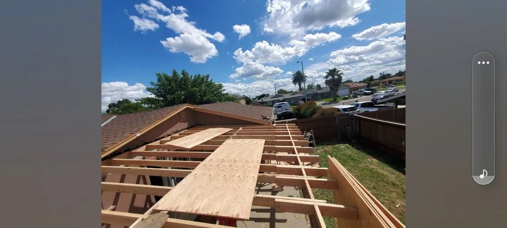 Slide of Everest Roofing