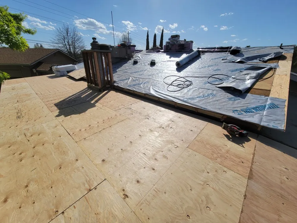 Slide of Everest Roofing