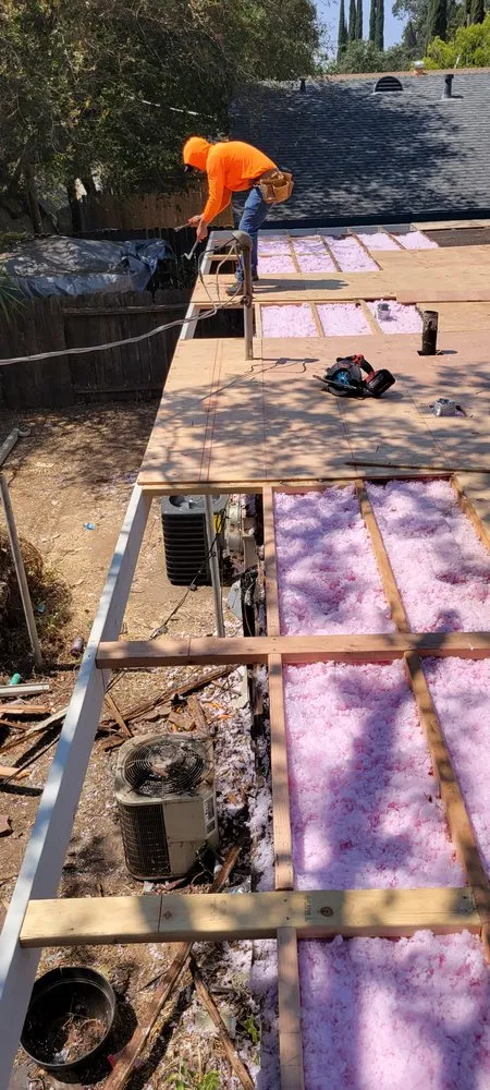 Slide of Everest Roofing