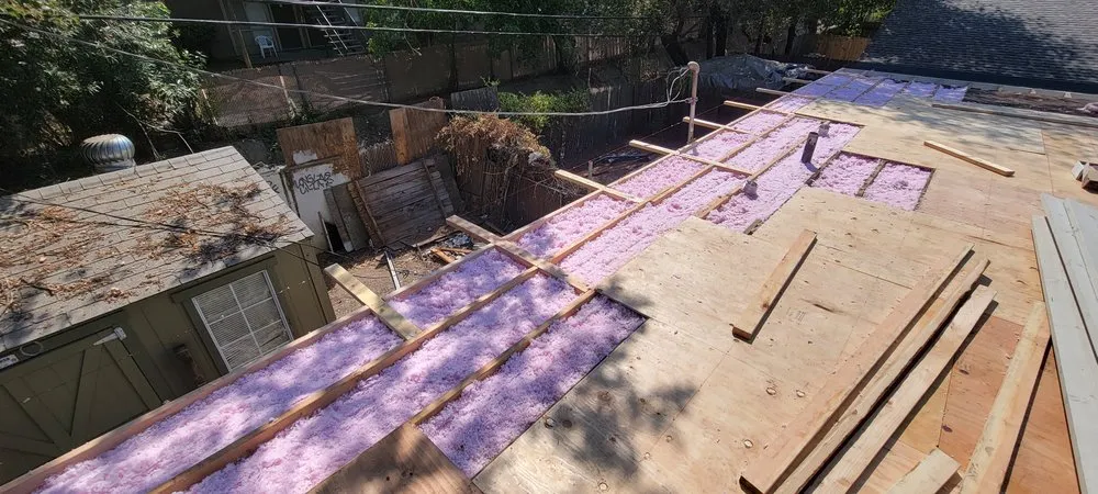 Slide of Everest Roofing