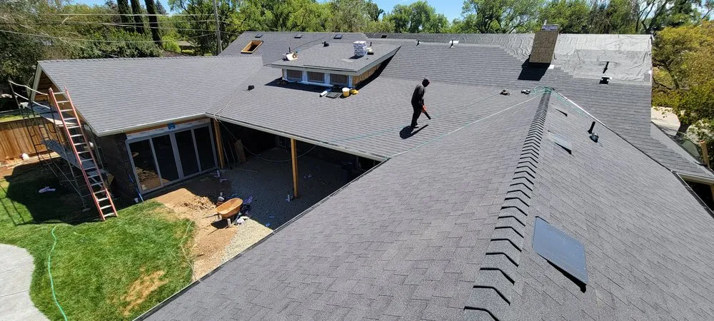 Slide of Everest Roofing