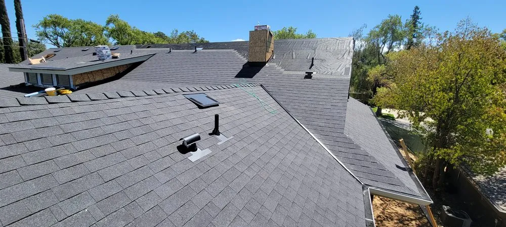 Slide of Everest Roofing