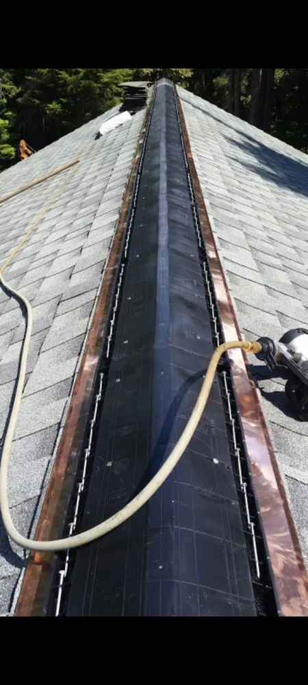 Slide of Everest Roofing