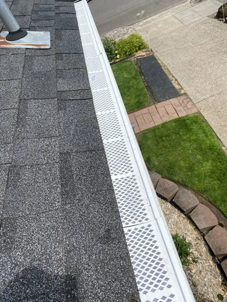 Slide of Evo Roofing & Gutter Cleaning