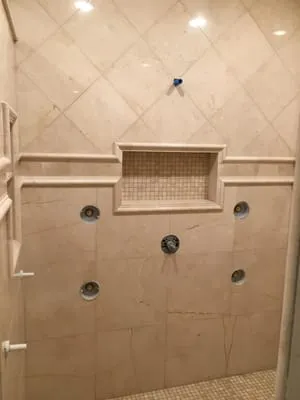 Evolution Tile & Marble, Inc. Logo