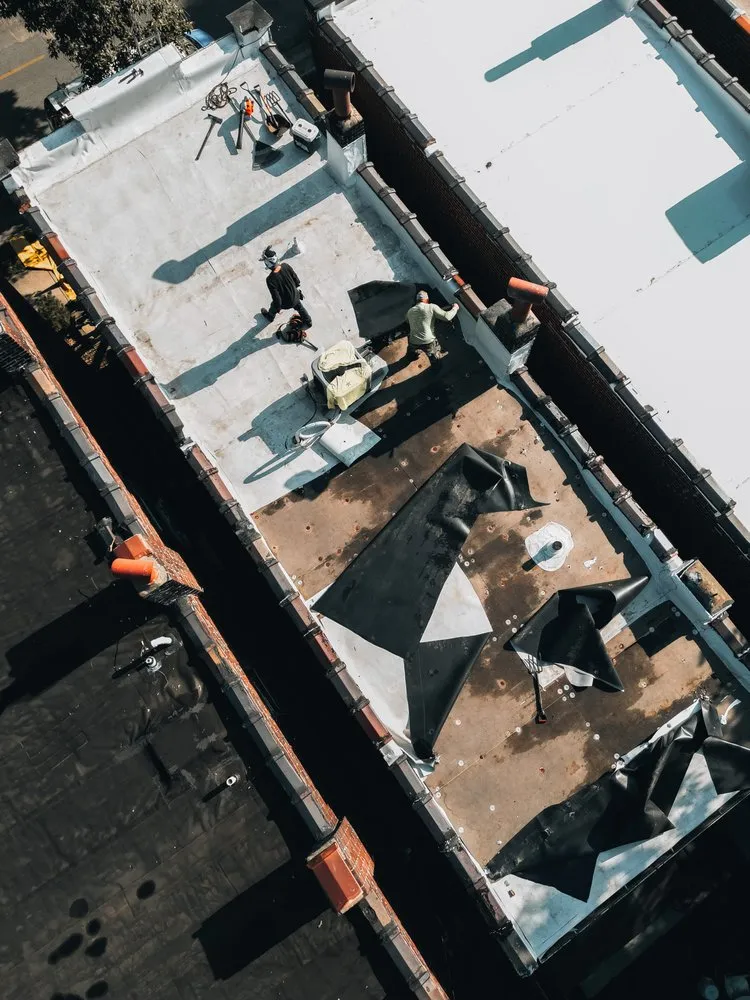 Slide of Evolved Roofing & Construction