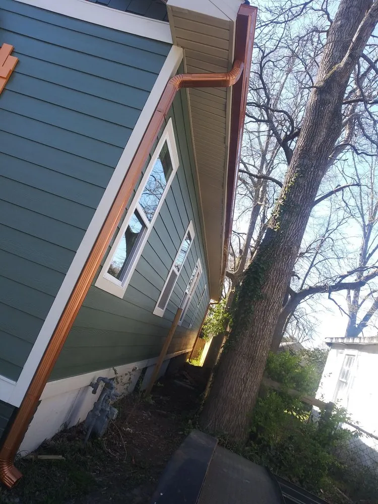 Slide of EW Roofing & Gutters