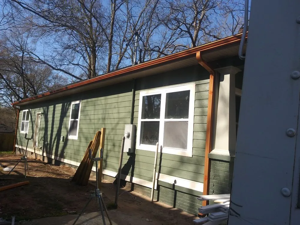 Slide of EW Roofing & Gutters