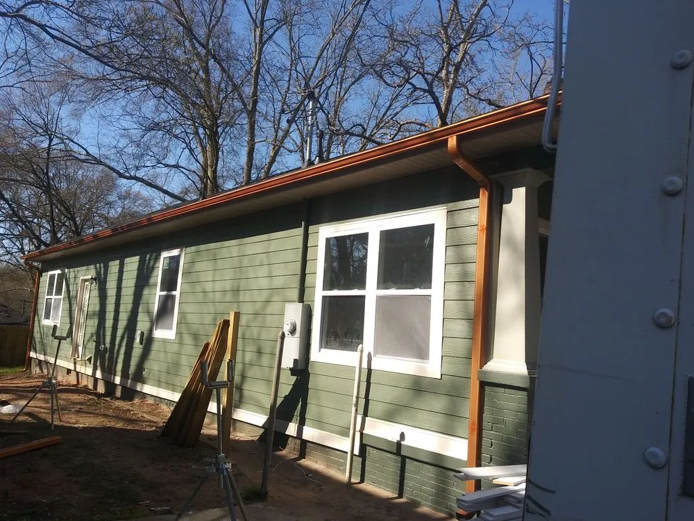 Slide of EW Roofing & Gutters