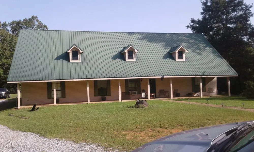 Trusted storm damage roof repair after storm damage in Tullos, LA by Ewing Metal Roofing