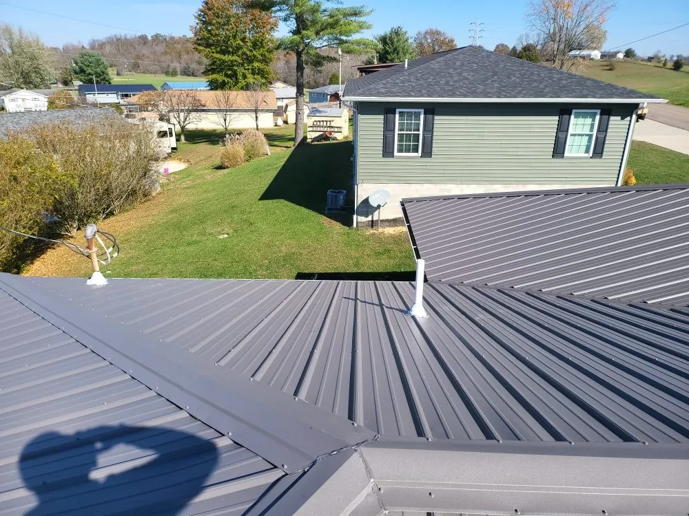 Slide of Ex-Amish Roofing