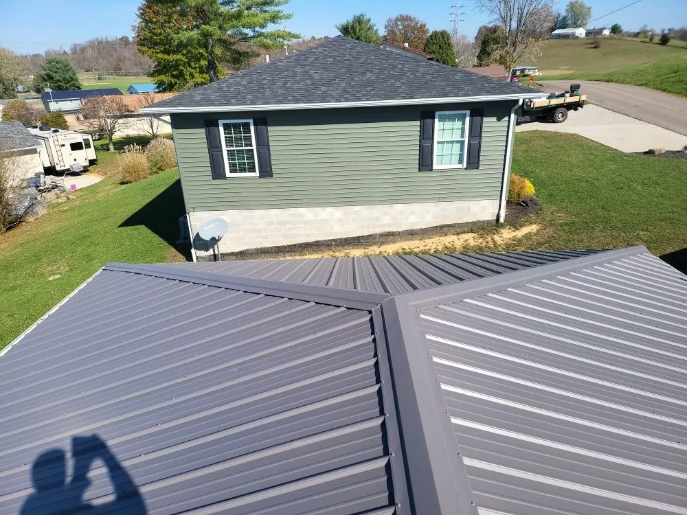 Slide of Ex-Amish Roofing
