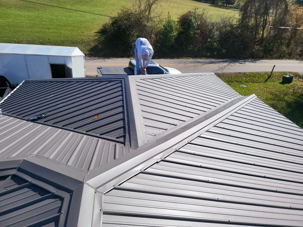 Slide of Ex-Amish Roofing