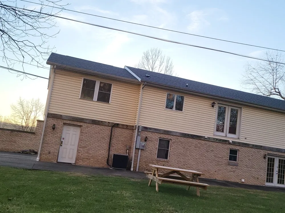 Slide of Ex-Amish Roofing