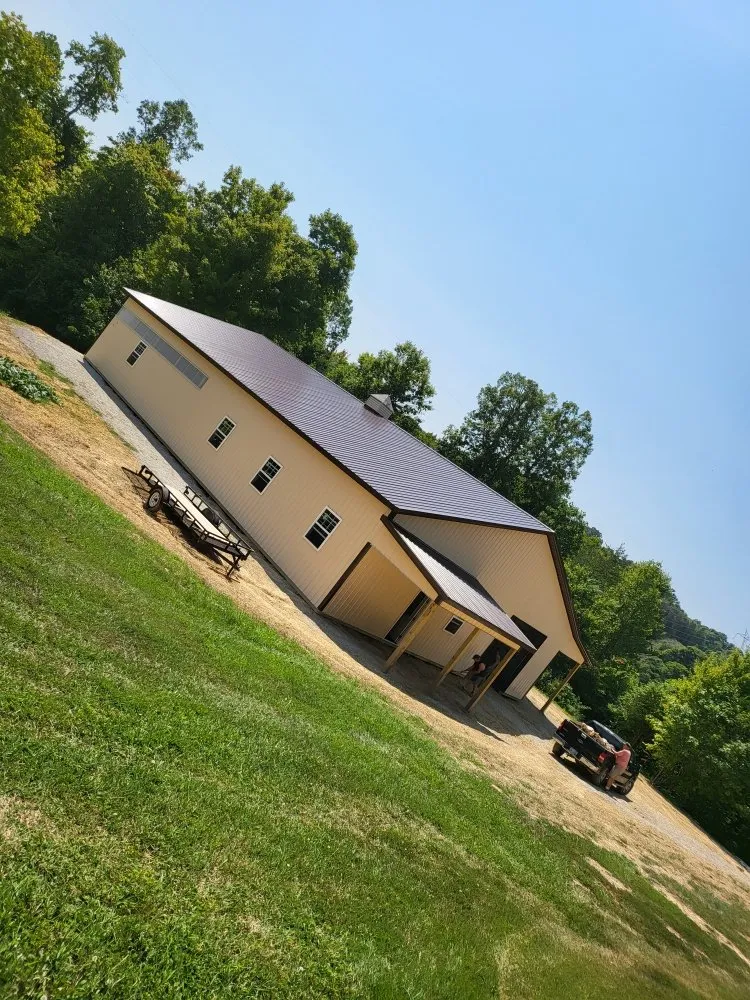 Slide of Ex-Amish Roofing