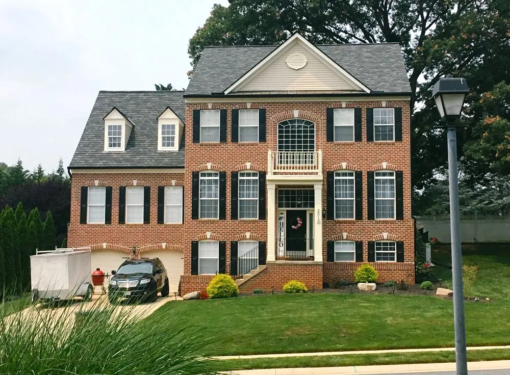 Slide of Excel Roofing