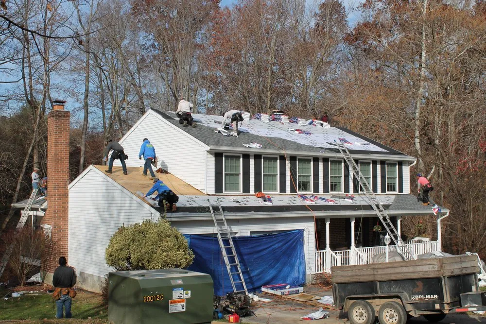 Slide of Excel Roofing