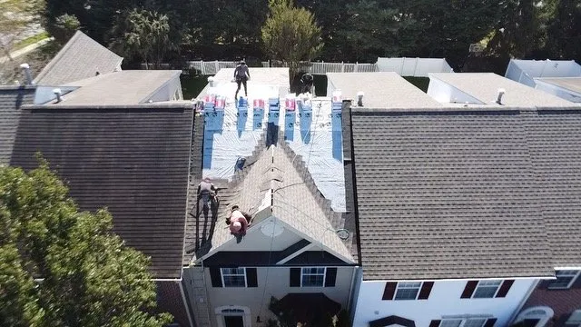 Slide of Excel Roofing