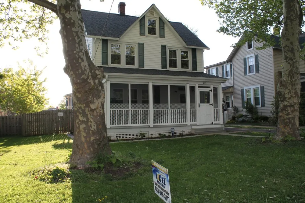 Slide of Excel Roofing