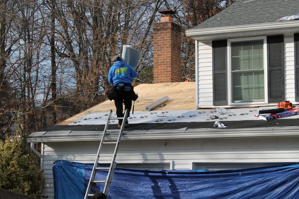 Slide of Excel Roofing