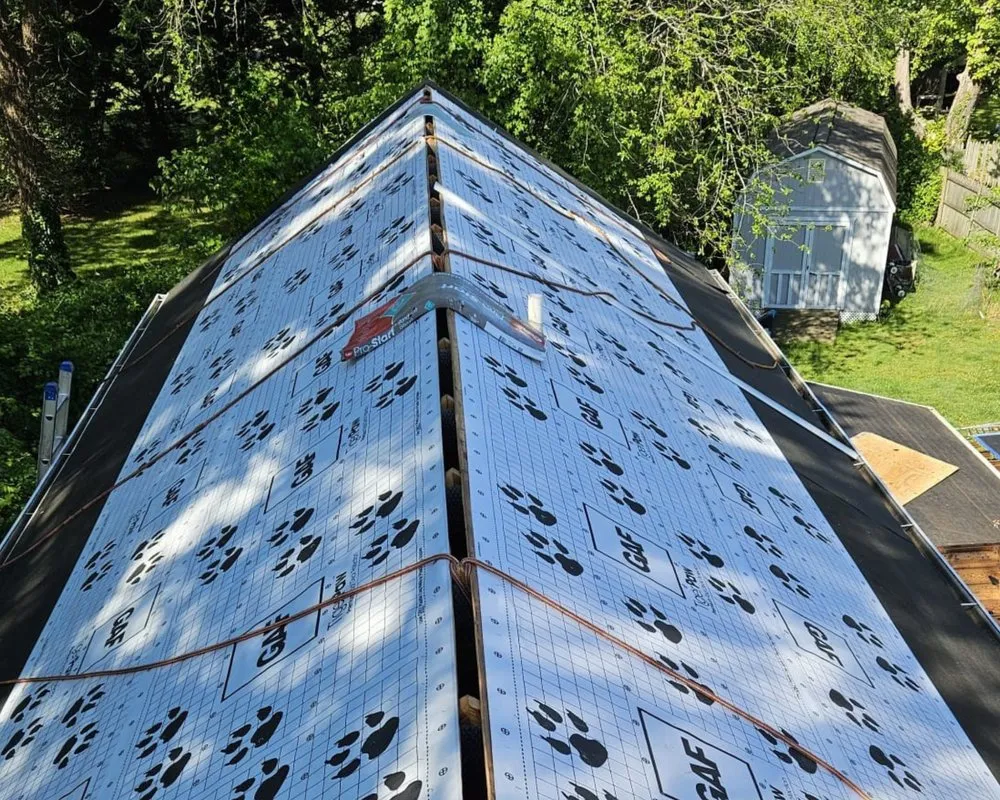 Slide of Excel Roofing