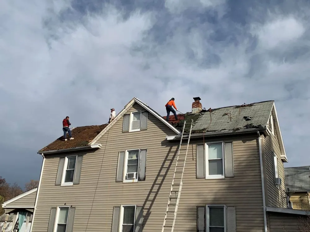 Slide of Excel Roofing