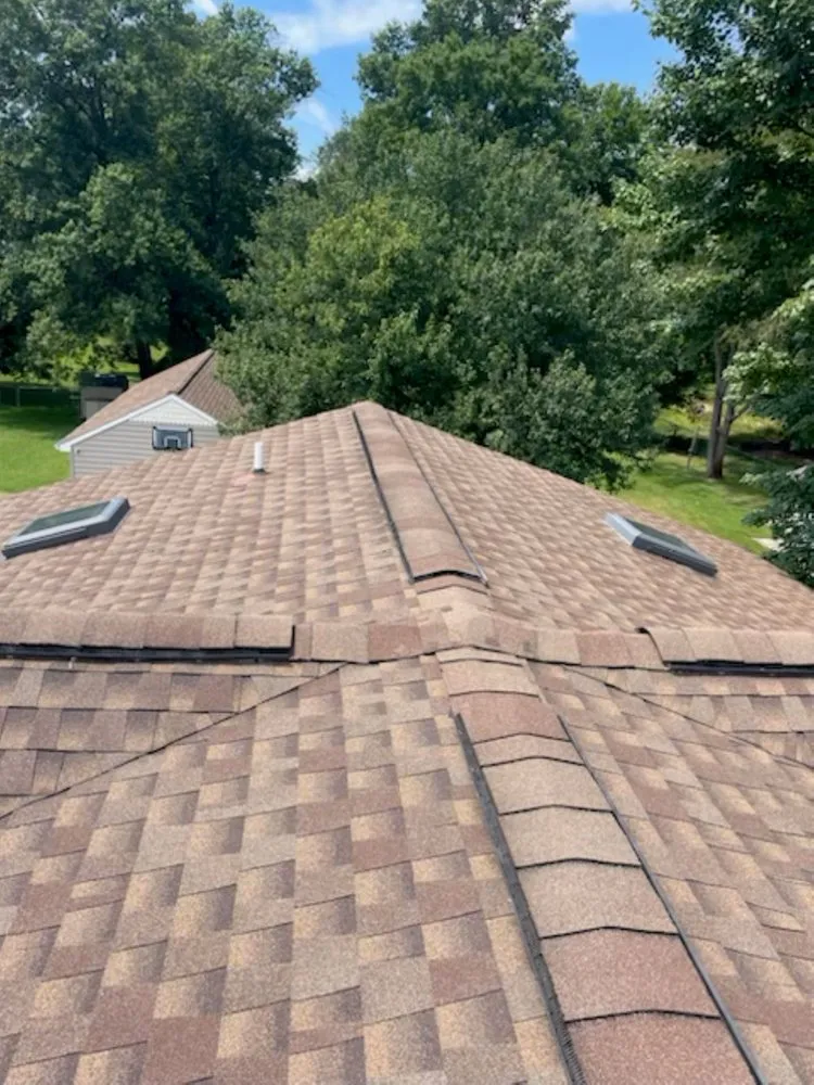 Slide of Excel Roofing