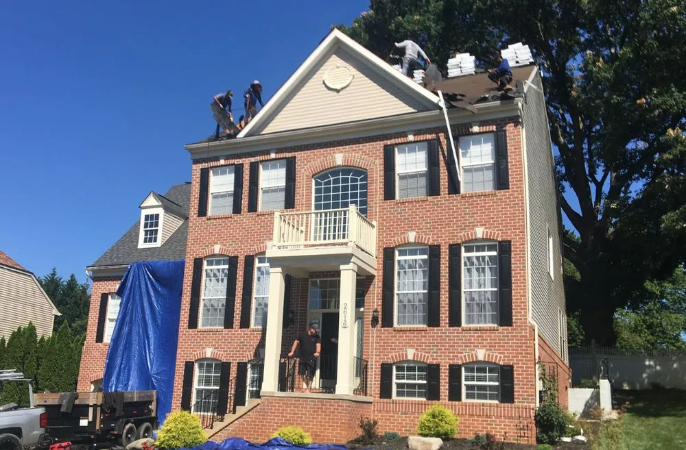 Slide of Excel Roofing