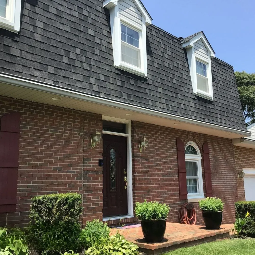 Slide of Excel Roofing