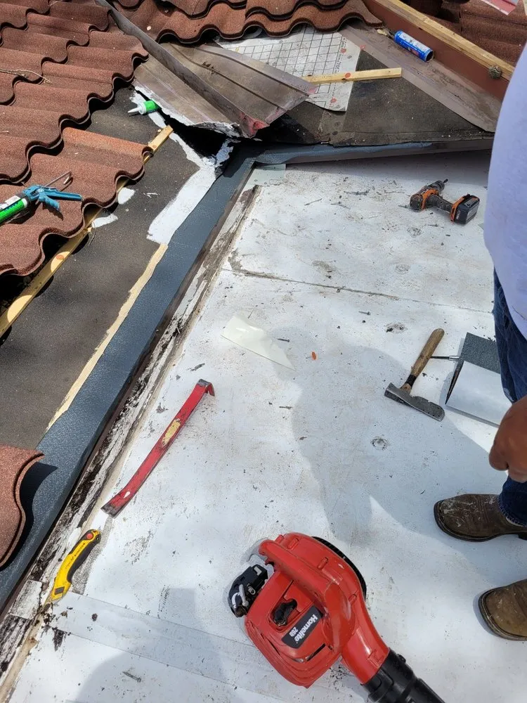 Slide of Excel Roofing