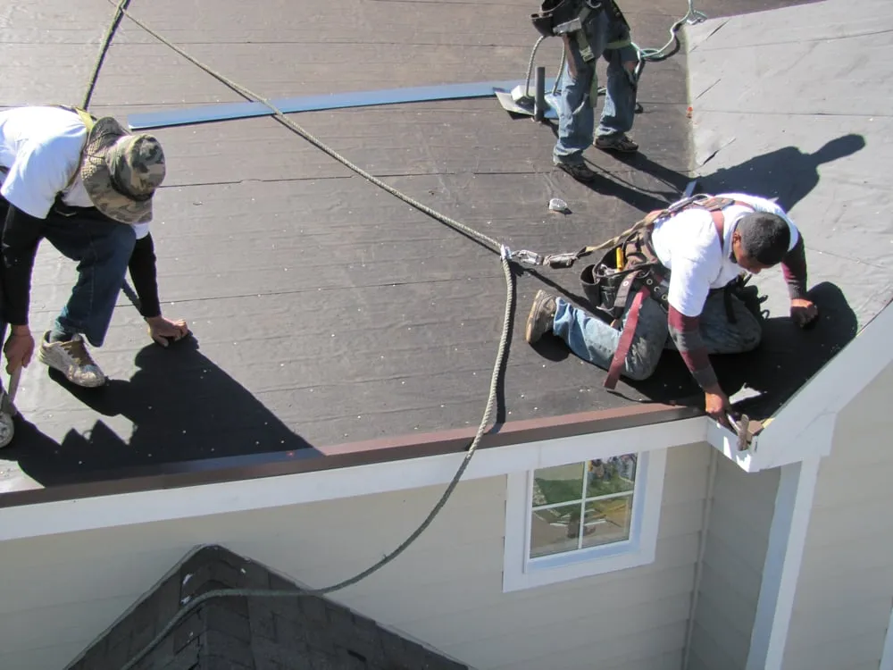 Slide of Excel Roofing