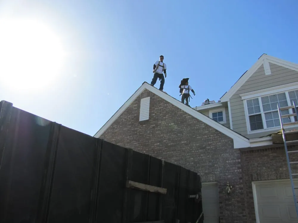 Slide of Excel Roofing