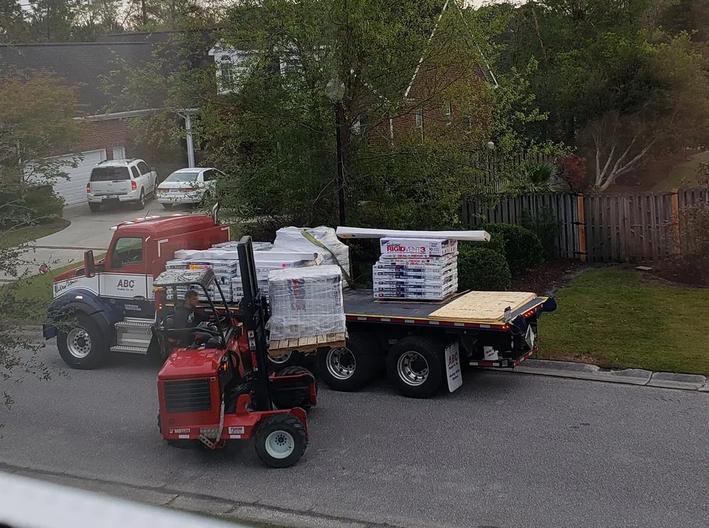 Slide of Excel Roofing Company