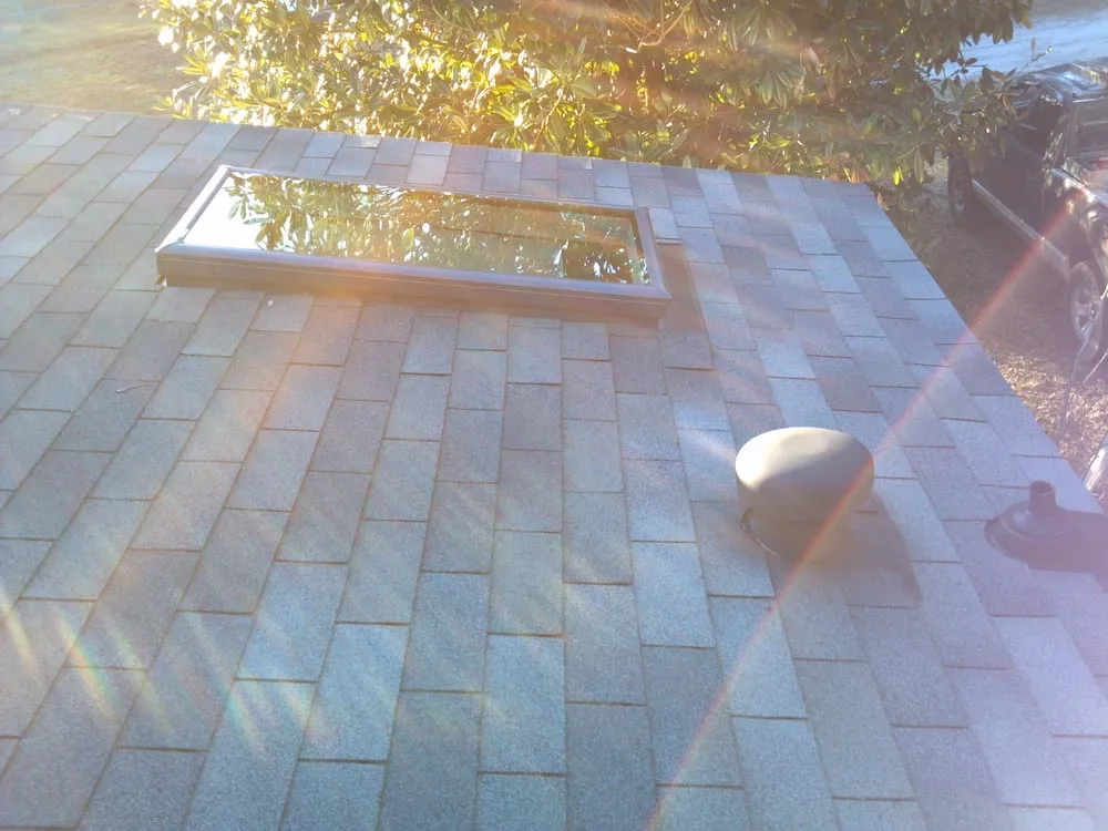 Slide of Excel Roofing Company