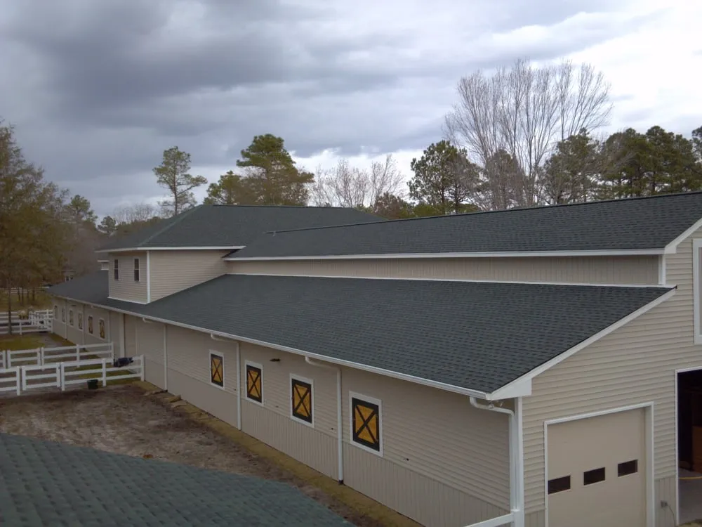 Slide of Excel Roofing Company