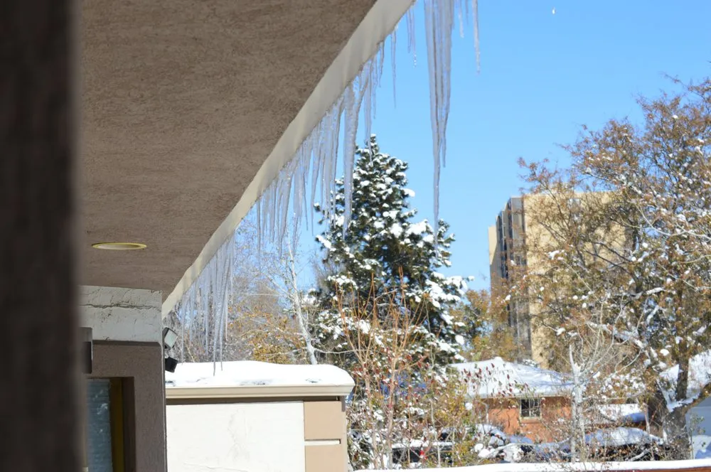 Slide of Excel Roofing