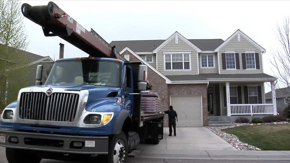 Slide of Excel Roofing