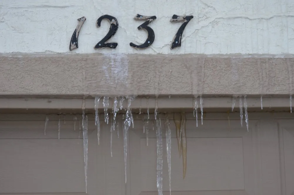 Slide of Excel Roofing