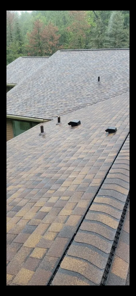 Slide of Excell Roofing