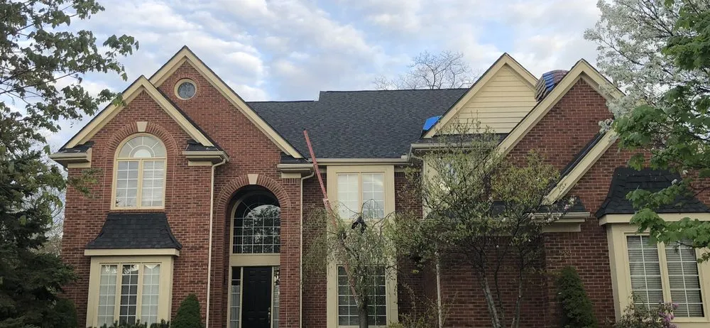 Slide of Excell Roofing