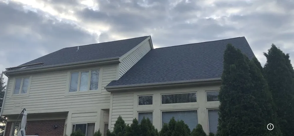 Slide of Excell Roofing