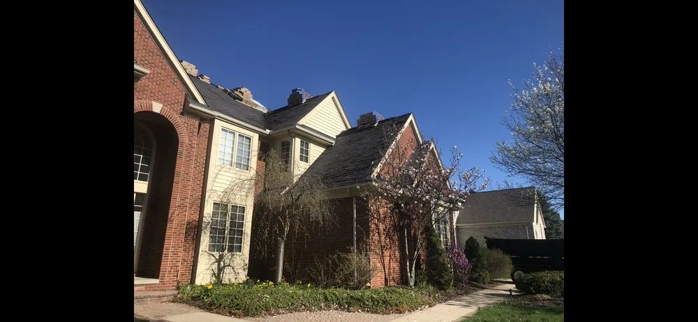 Slide of Excell Roofing