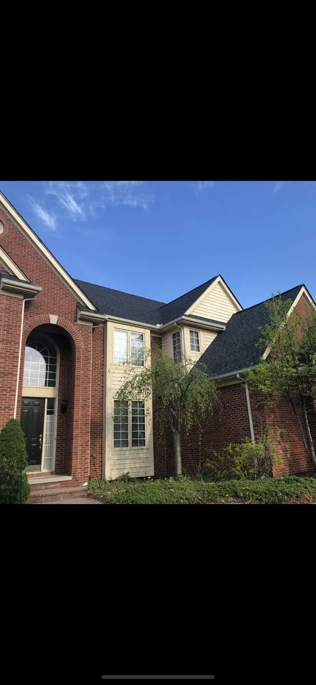 Slide of Excell Roofing