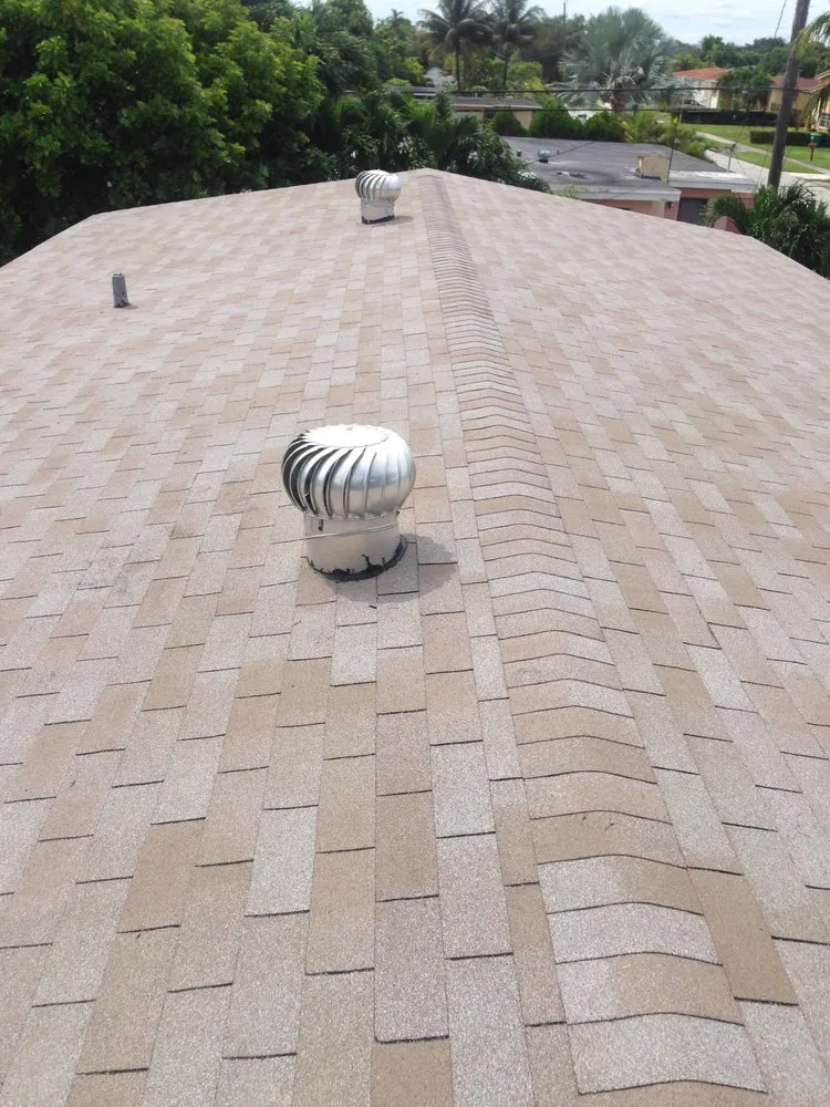 Slide of Excellence Roofing
