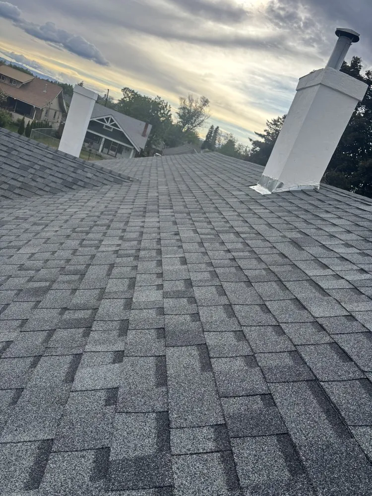 Slide of Exclusive Roofing