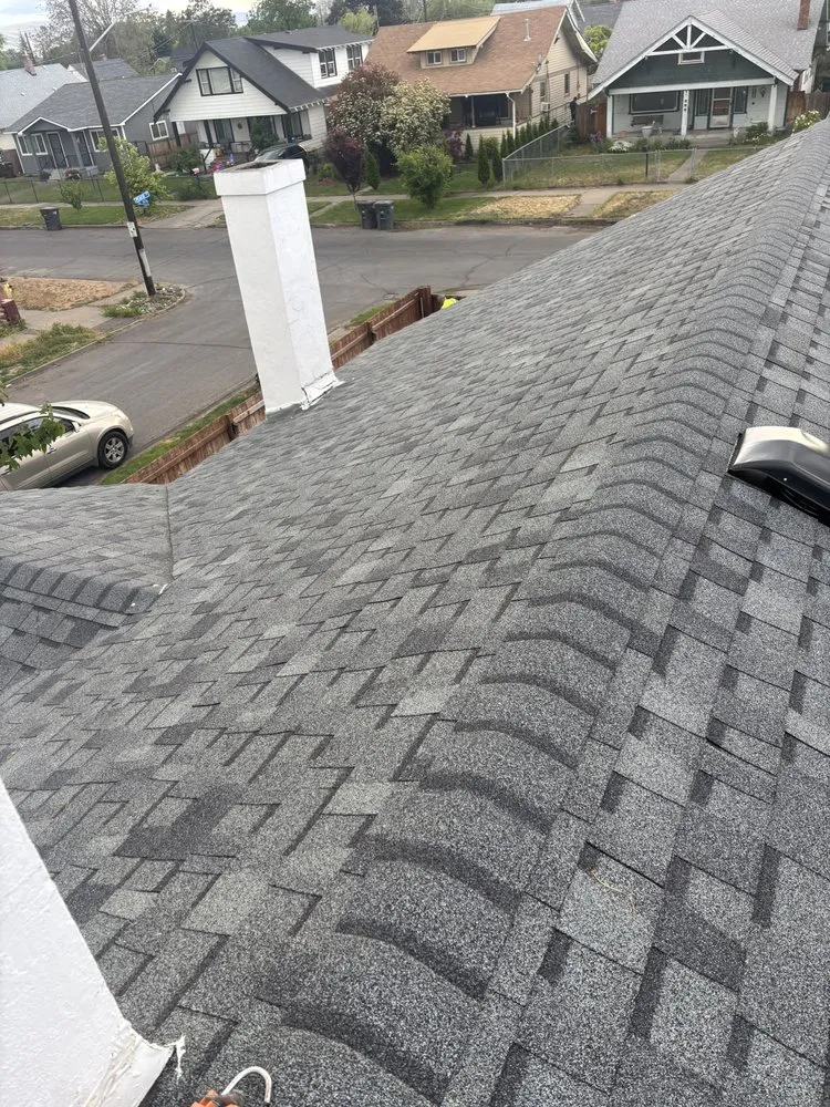 Slide of Exclusive Roofing