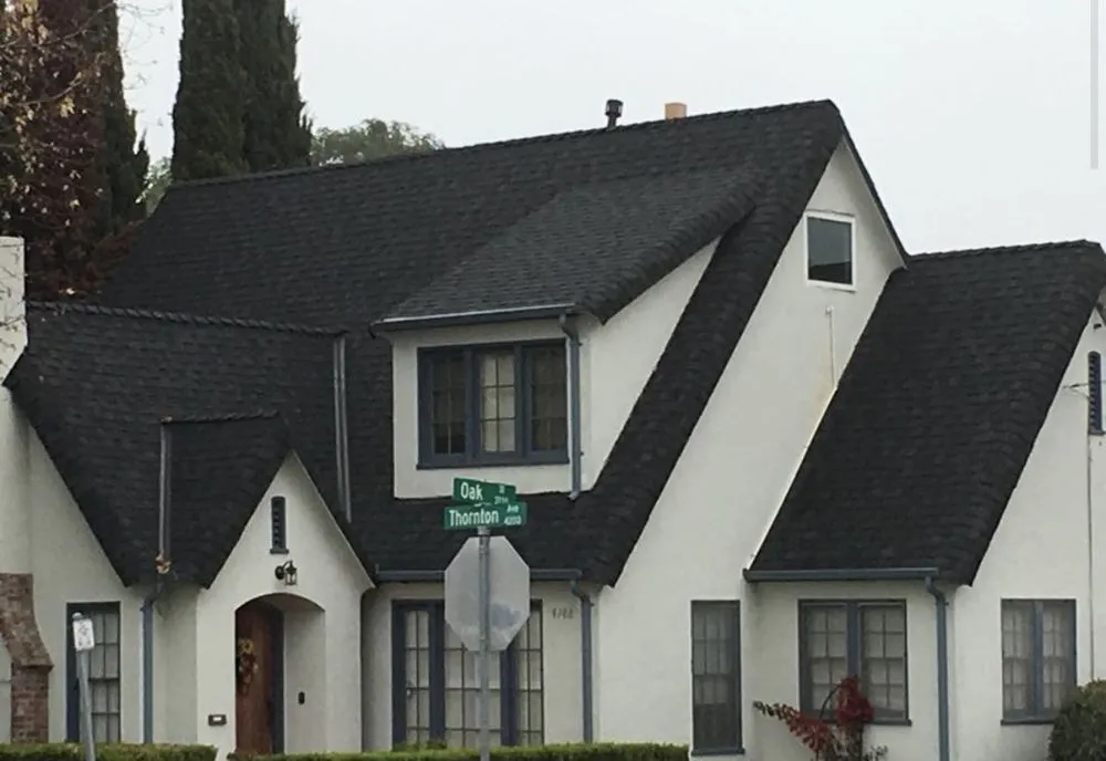 Slide of Exclusively Roofing