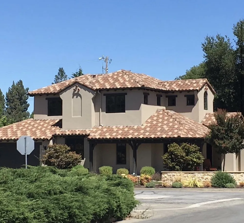 Slide of Exclusively Roofing